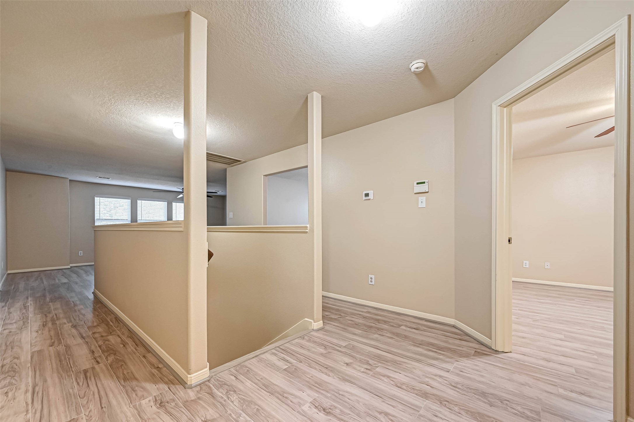 3522 Clipper Winds Way Houston, TX 77084 - Photo 41 of 48 a view of empty room with wooden floor