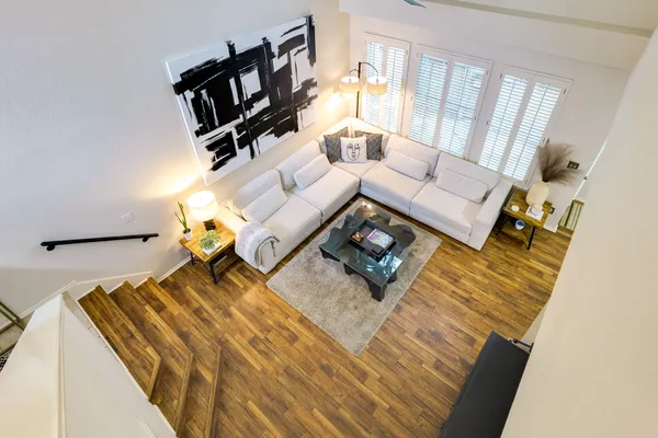 a bedroom with a bed furniture and a window