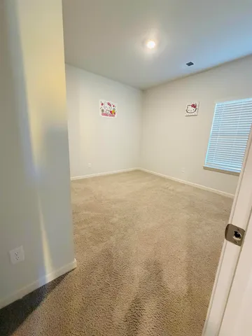 an empty room with natural light