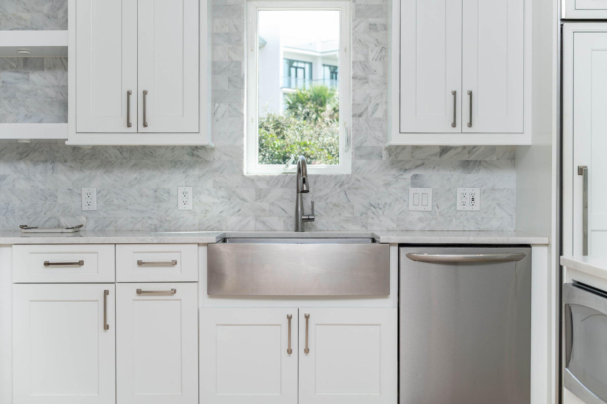 4525-4499 West County Highway 30A Santa Rosa Beach, FL 32459 - Photo 41 of 130 a kitchen with white cabinets and a sink