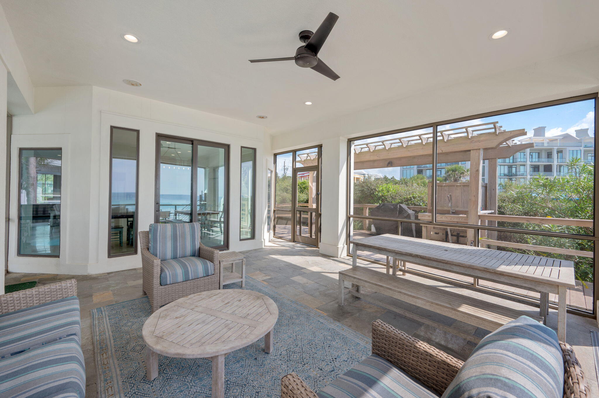 4525-4499 West County Highway 30A Santa Rosa Beach, FL 32459 - Photo 46 of 130 a living room with furniture and a large window