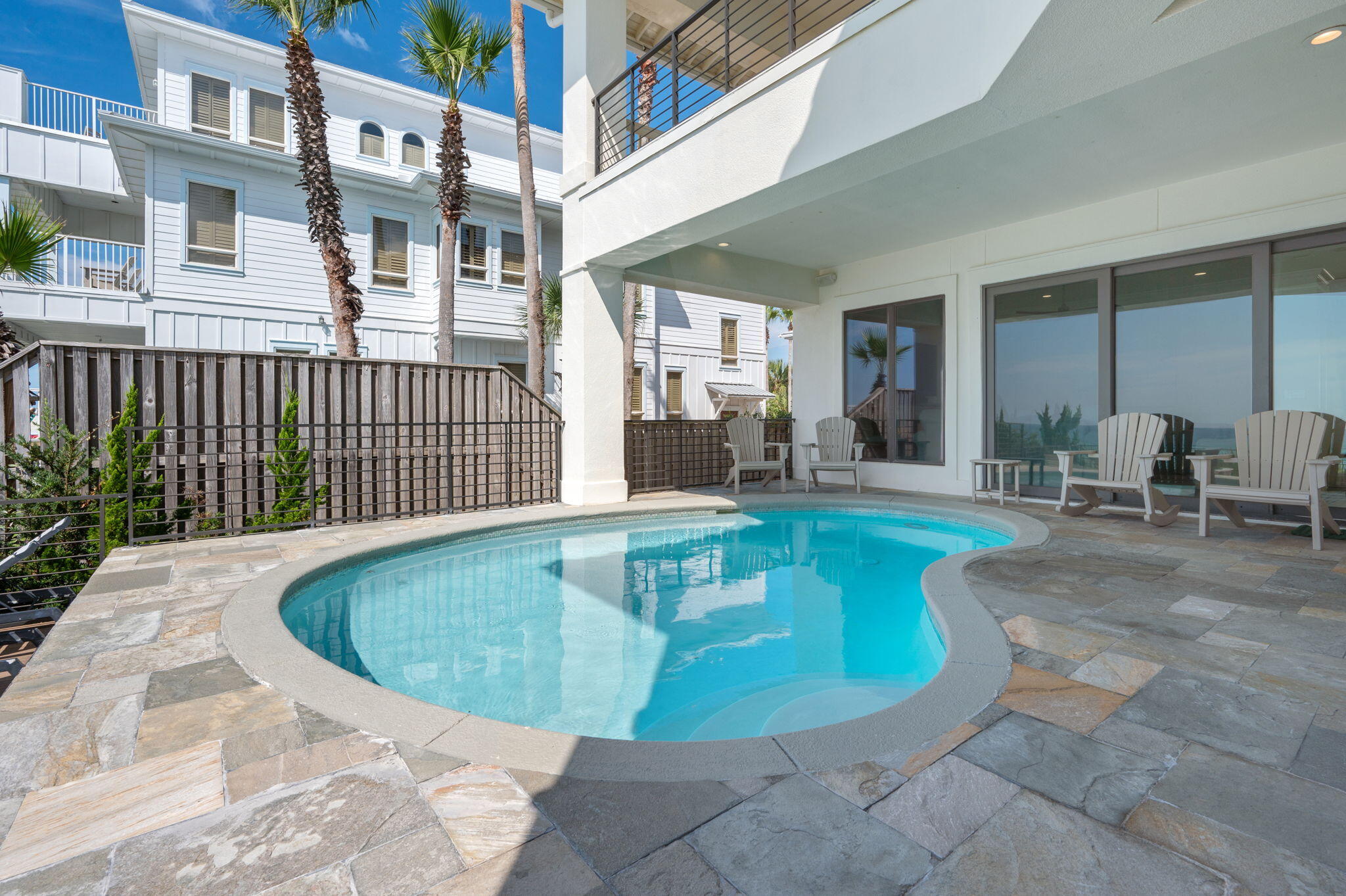 4525-4499 West County Highway 30A Santa Rosa Beach, FL 32459 - Photo 48 of 130 a view of a swimming pool with sitting area