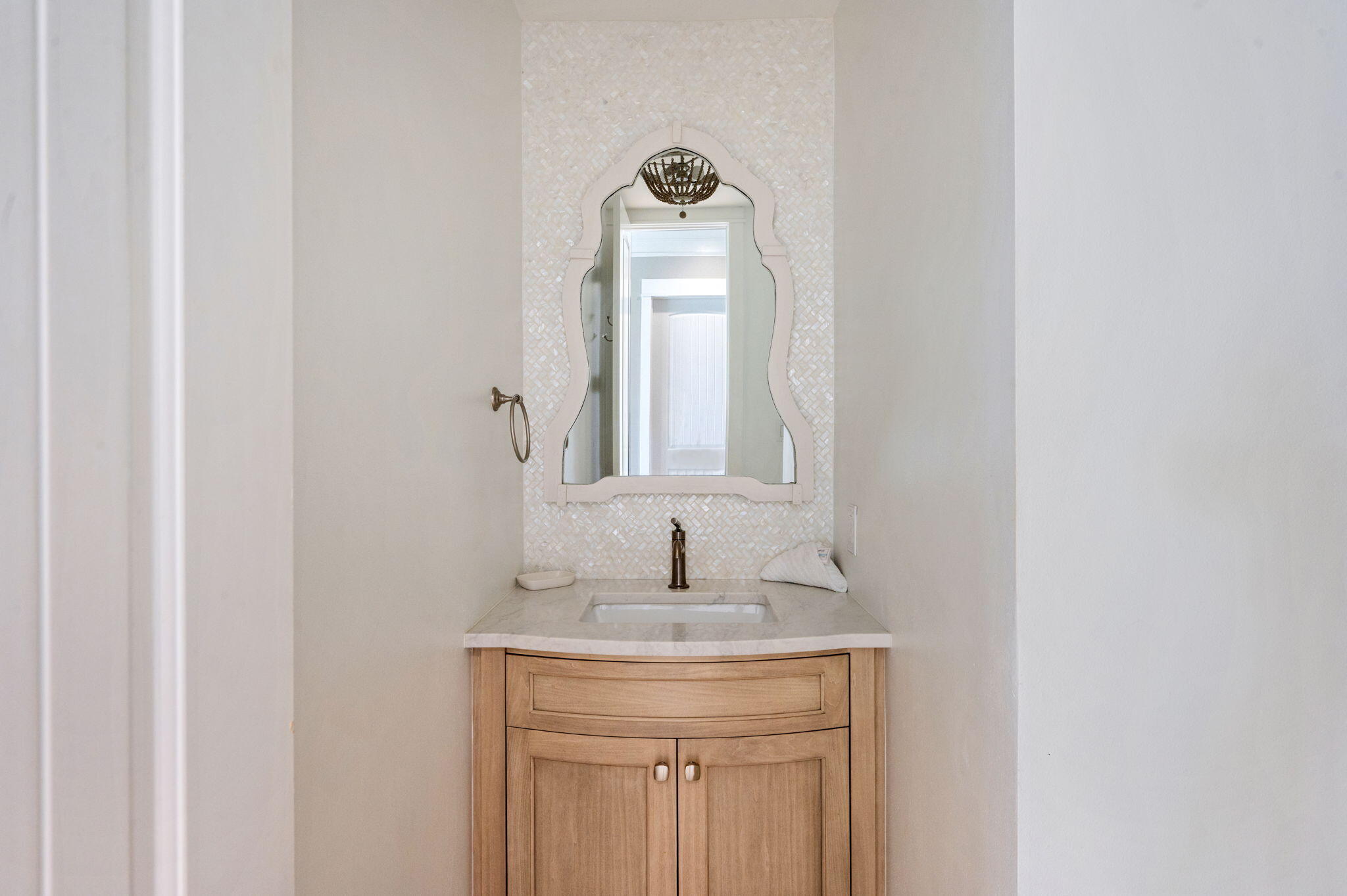 4525-4499 West County Highway 30A Santa Rosa Beach, FL 32459 - Photo 57 of 130 a bathroom with a sink and a mirror