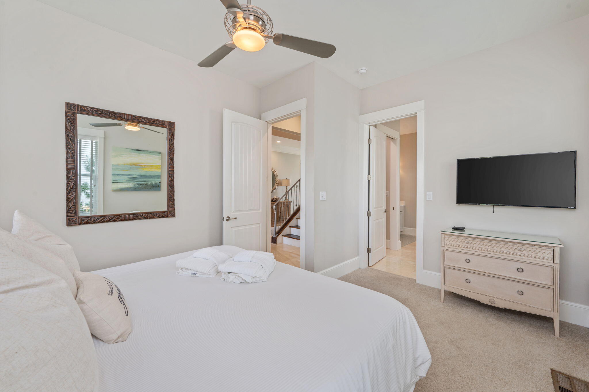 4525-4499 West County Highway 30A Santa Rosa Beach, FL 32459 - Photo 64 of 130 a bedroom with a bed and a flat screen tv
