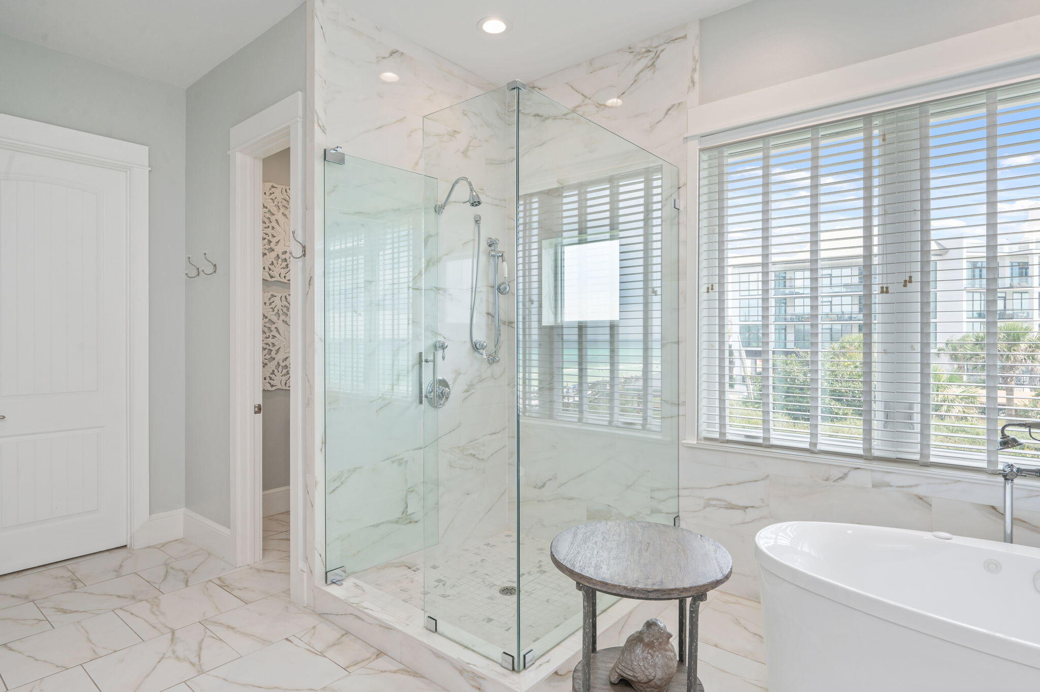 4525-4499 West County Highway 30A Santa Rosa Beach, FL 32459 - Photo 77 of 130 a bathroom with a granite countertop sink a toilet and shower