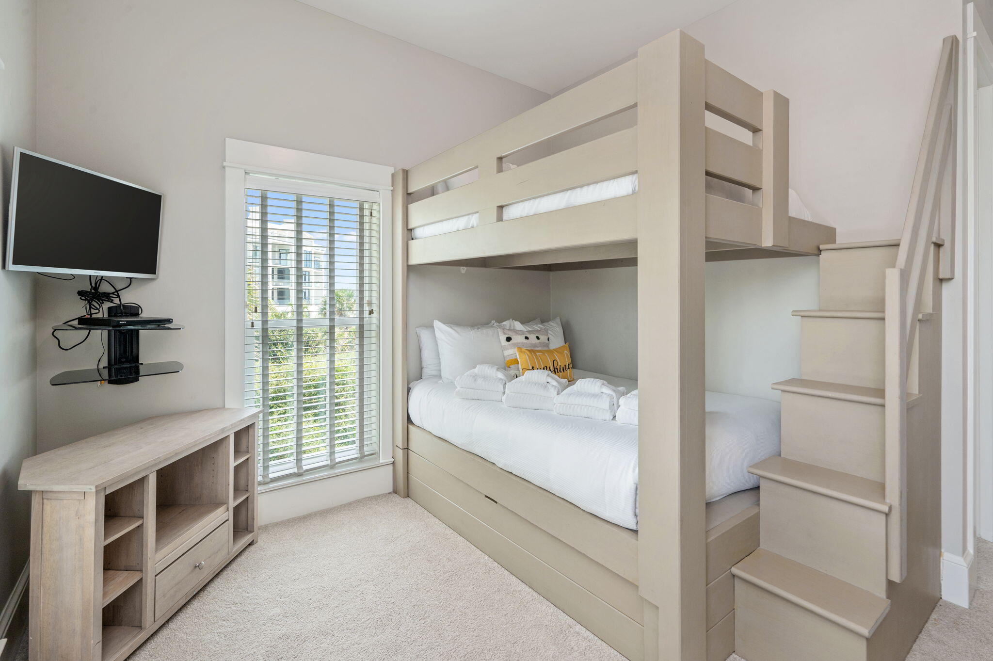 4525-4499 West County Highway 30A Santa Rosa Beach, FL 32459 - Photo 89 of 130 a room with a bed and a flat tv screen