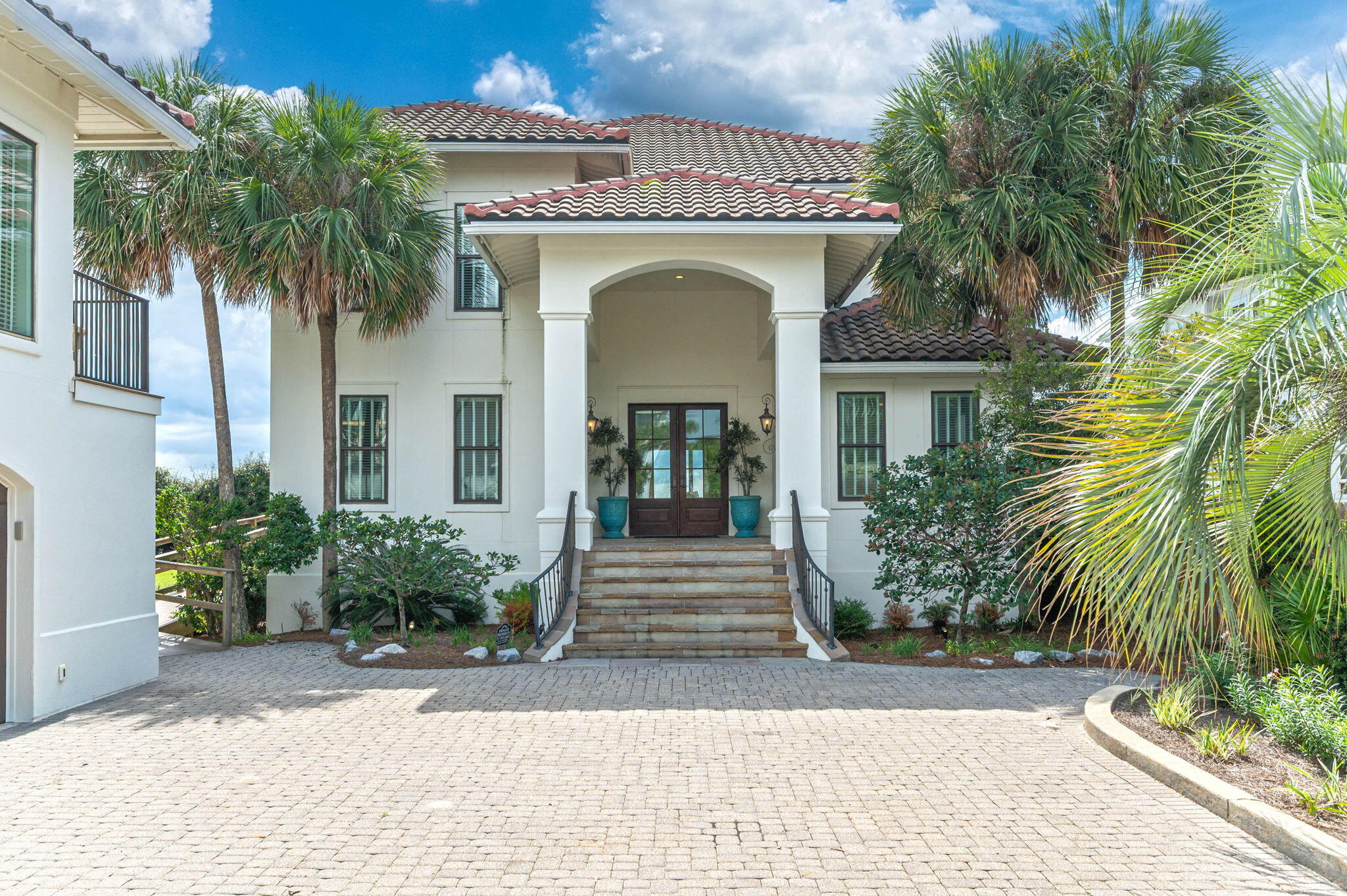 4525-4499 West County Highway 30A Santa Rosa Beach, FL 32459 - Photo 10 of 130 a front view of a house with plants
