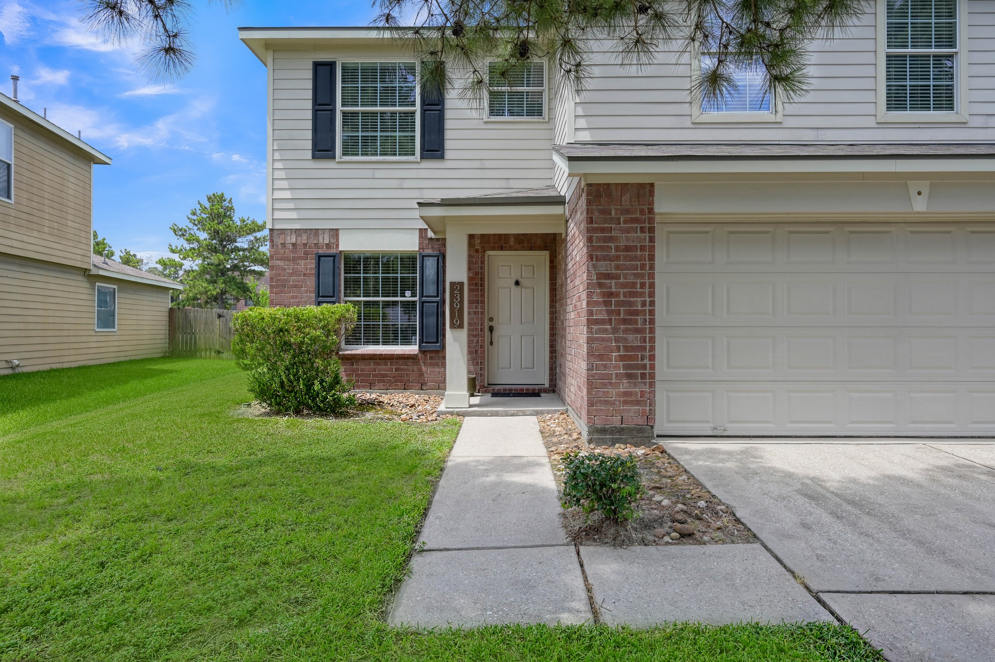 23919 Kingbriar Drive Spring, TX 77373 - Photo 3 of 33 A covered front entry welcomes you home and provides an inviting transition into the thoughtfully designed interior.