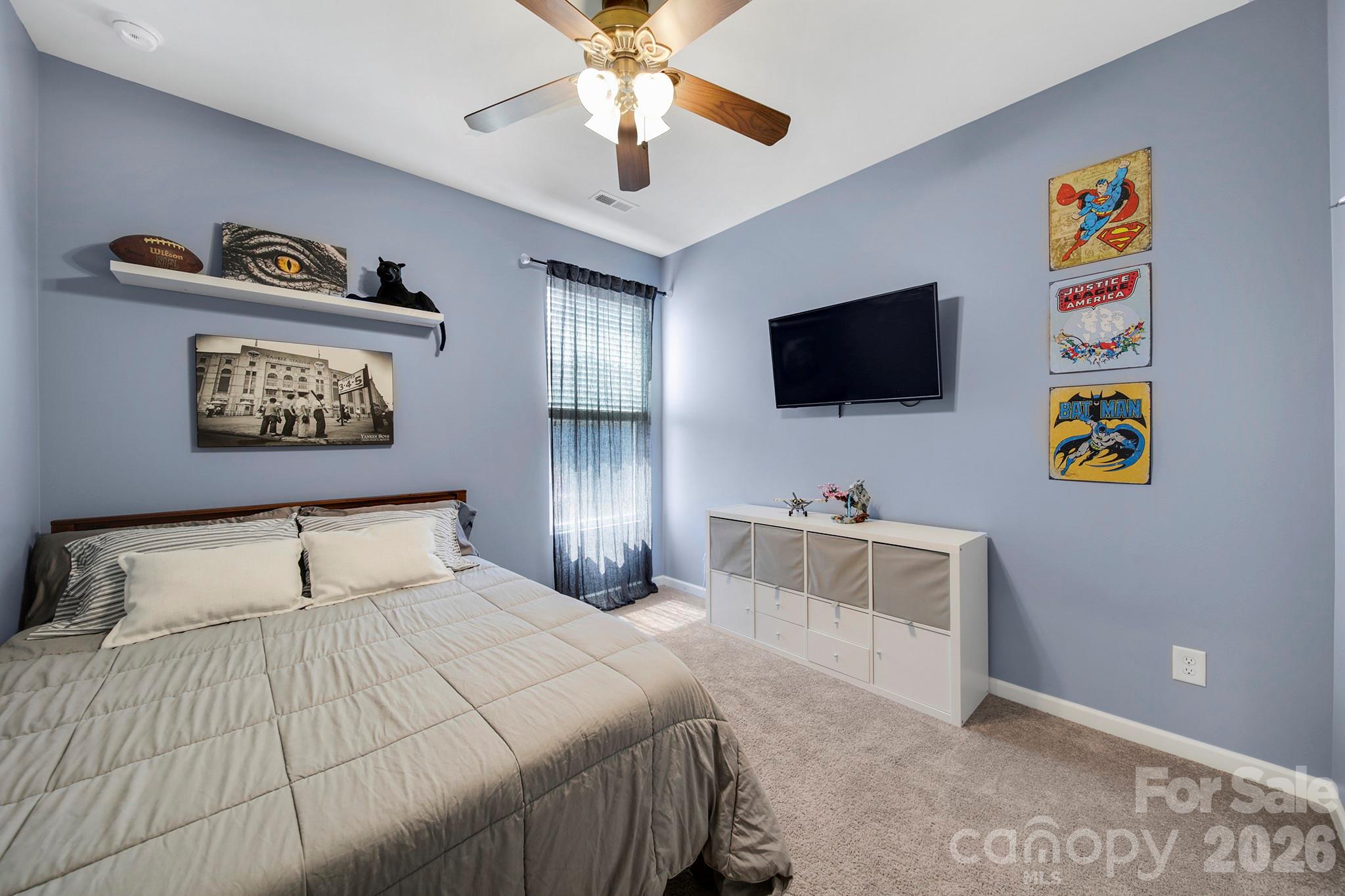 2217 Attaran Lane Lancaster, SC 29720 - Photo 18 of 25 a bedroom with a bed and a flat screen tv
