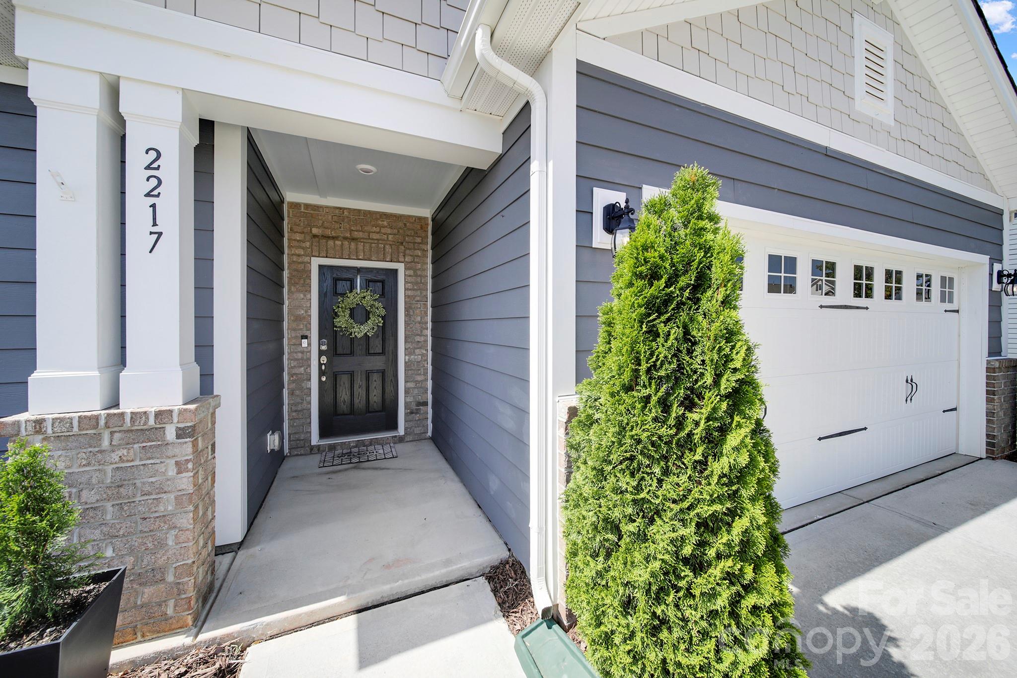 2217 Attaran Lane Lancaster, SC 29720 - Photo 2 of 25 front view of a house with a yard