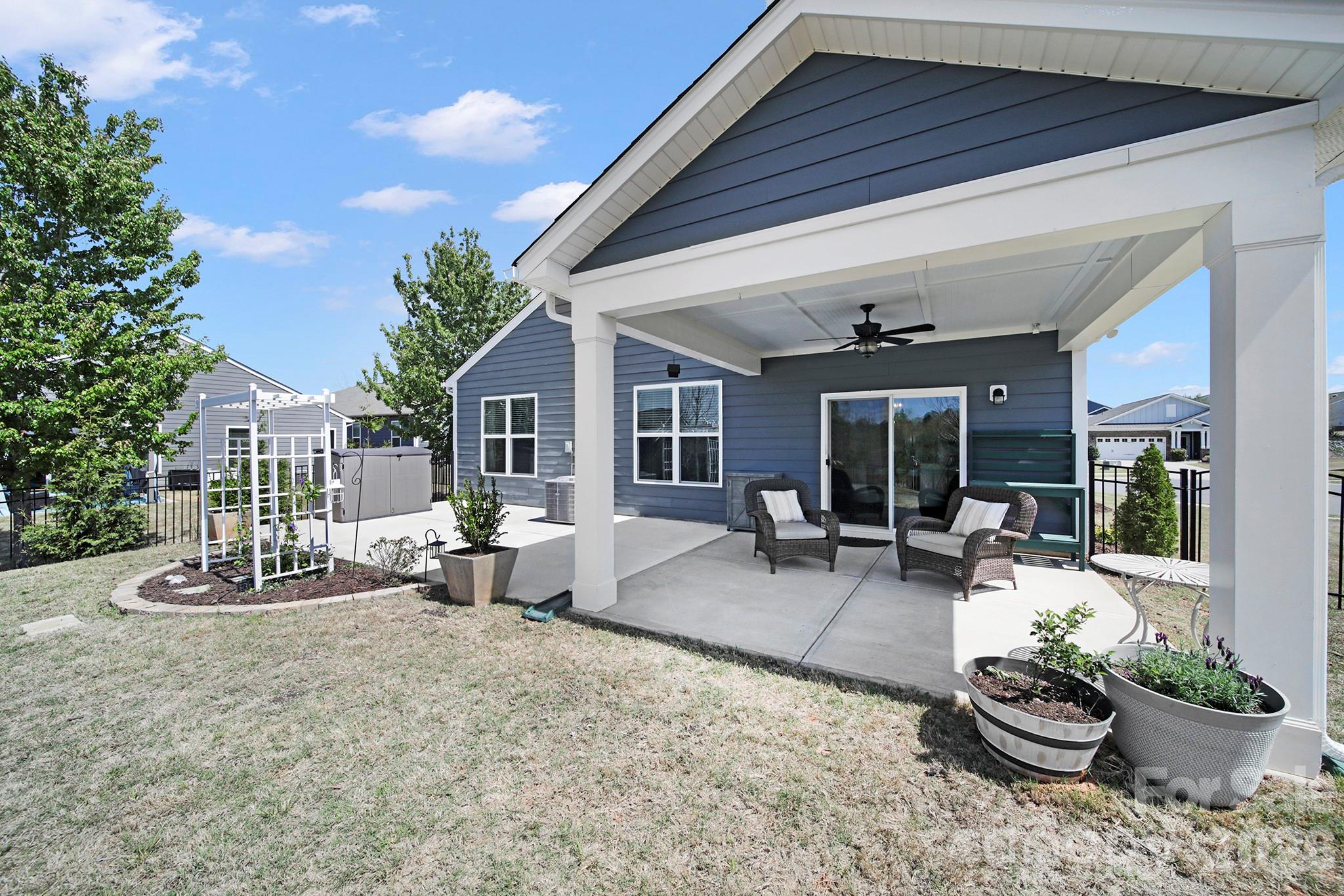 2217 Attaran Lane Lancaster, SC 29720 - Photo 21 of 25 a building outdoor space with patio furniture and potted plants