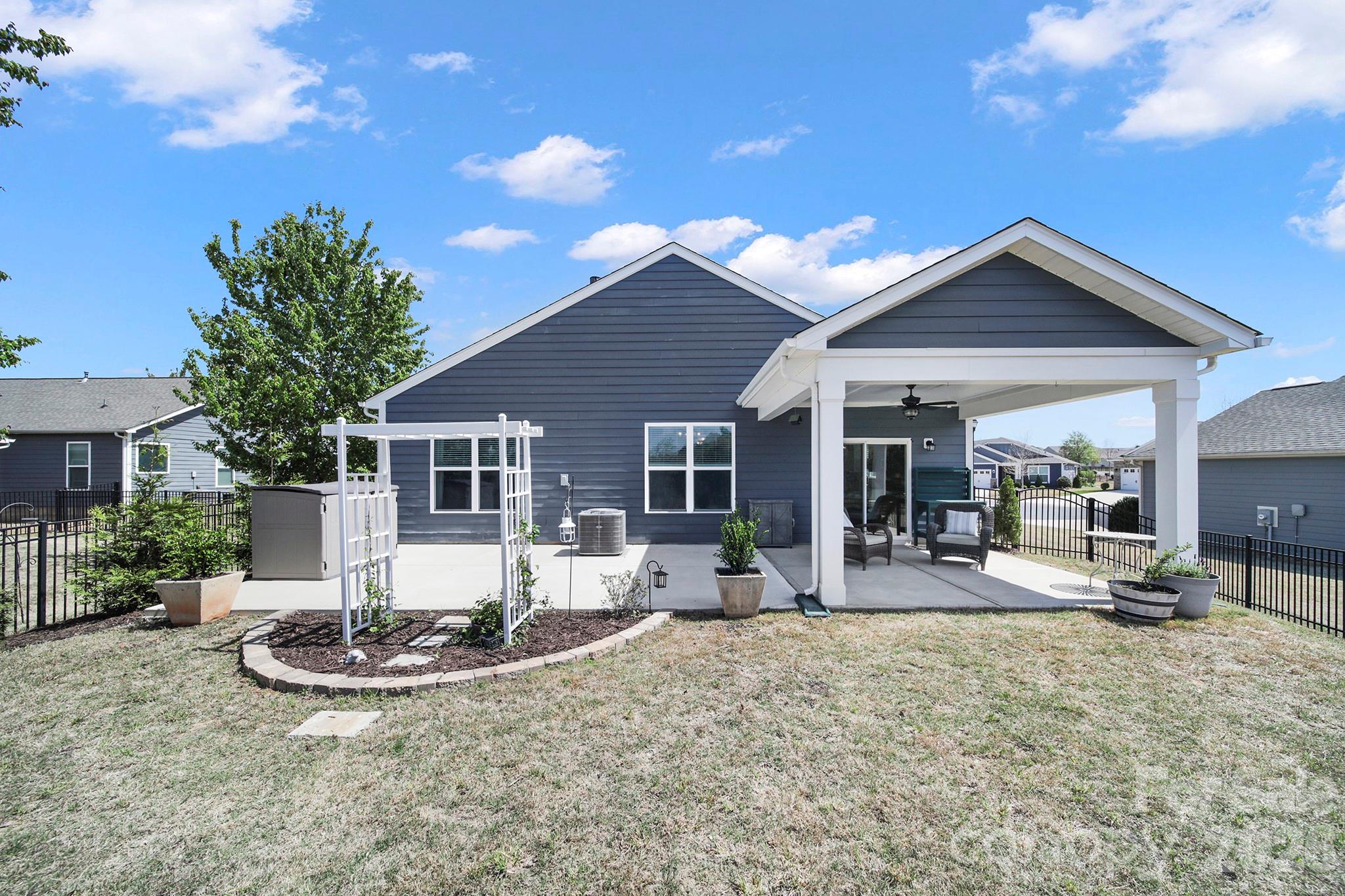 2217 Attaran Lane Lancaster, SC 29720 - Photo 22 of 25 a view of a house with backyard and sitting area