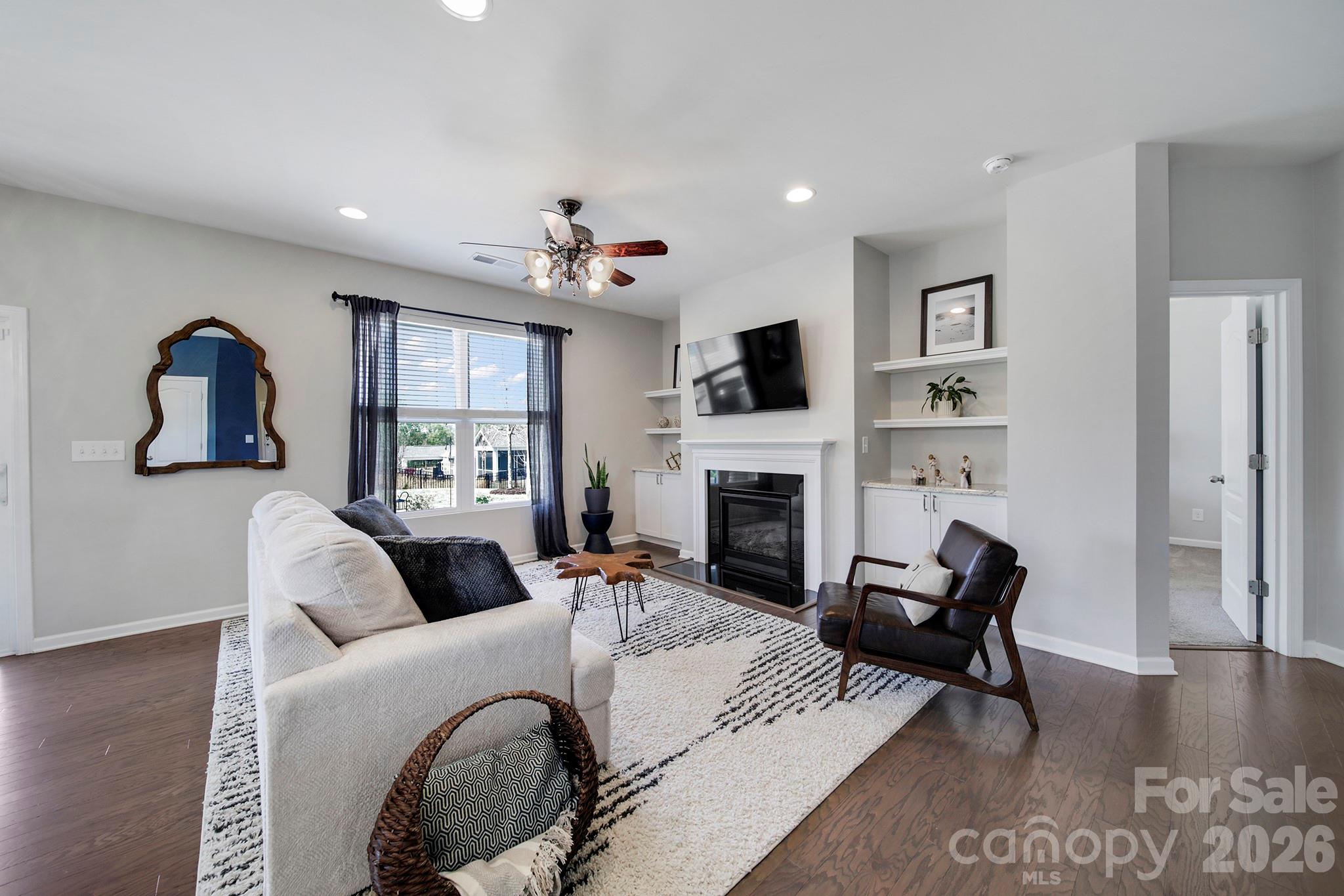 2217 Attaran Lane Lancaster, SC 29720 - Photo 6 of 25 a living room with furniture and a fireplace