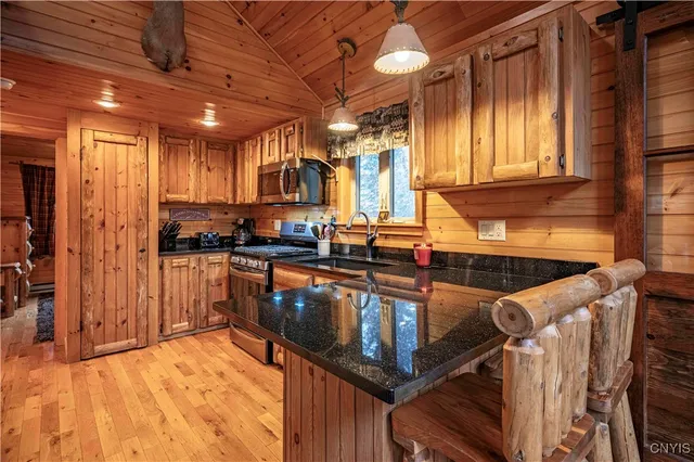 $499,900 | 143 Pawnee Drive West, Webb, NY 13420