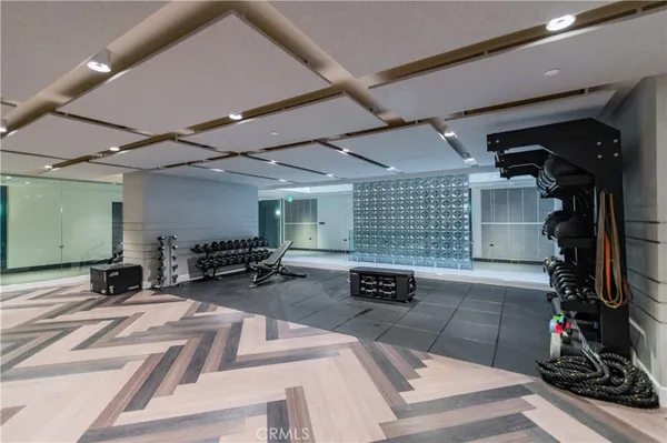 a view of a patio with a table and chairs in a patio