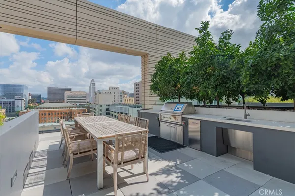 a view of a terrace with sitting area