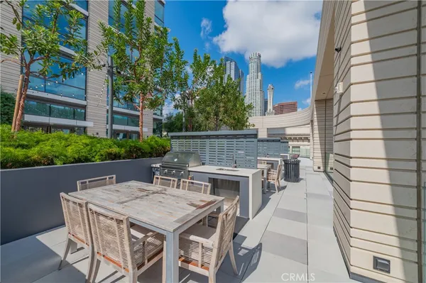 a view of a terrace with sitting area
