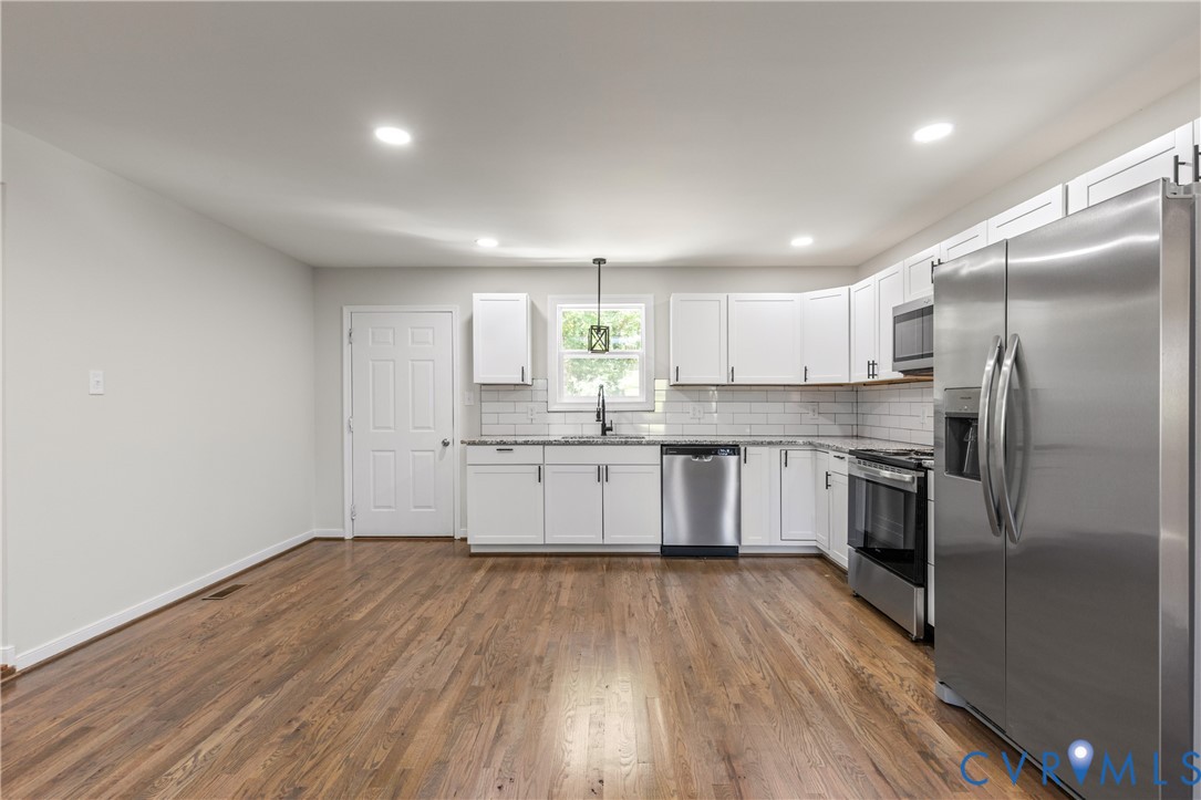 8409 Hopkins Road North Chesterfield, VA 23237 - Photo 13 of 51 Hardwood flooring, recessed lighting, white cabine