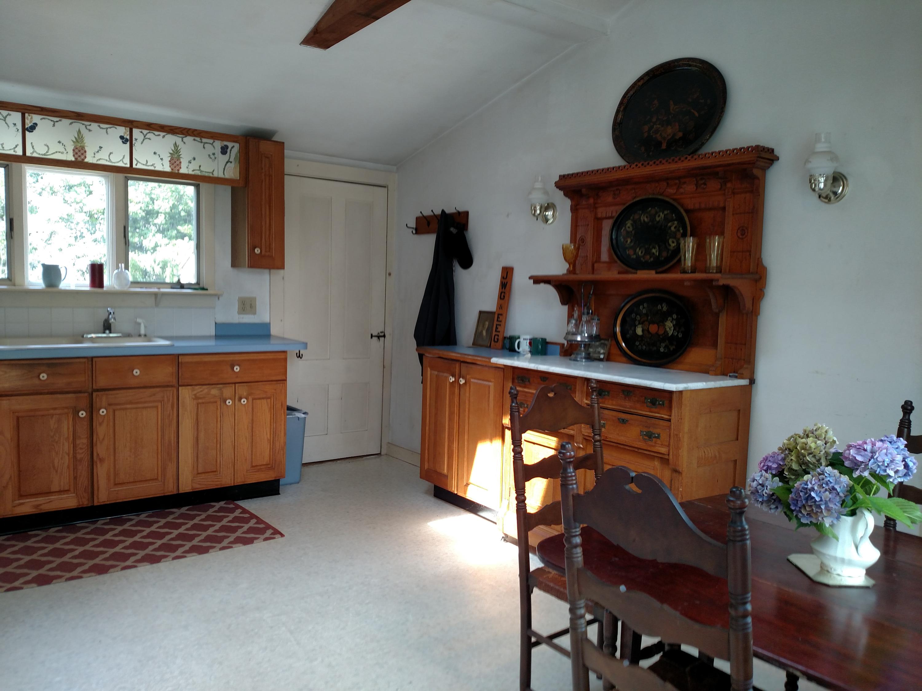 105 Spring Hill Road East Sandwich, MA 02537 - Photo 11 of 33 a dining room with furniture and a window
