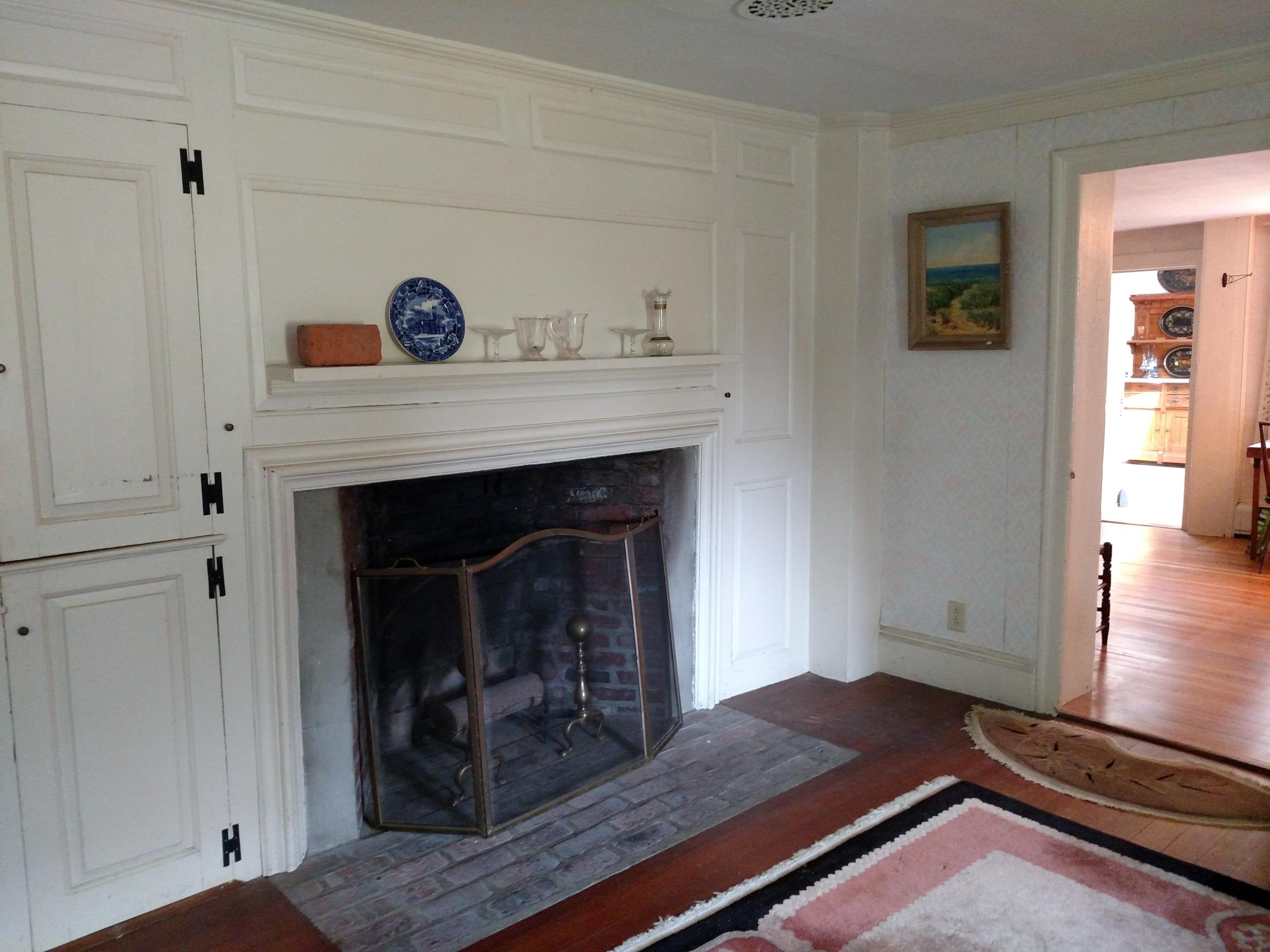 105 Spring Hill Road East Sandwich, MA 02537 - Photo 14 of 33 a living room with furniture and a fireplace