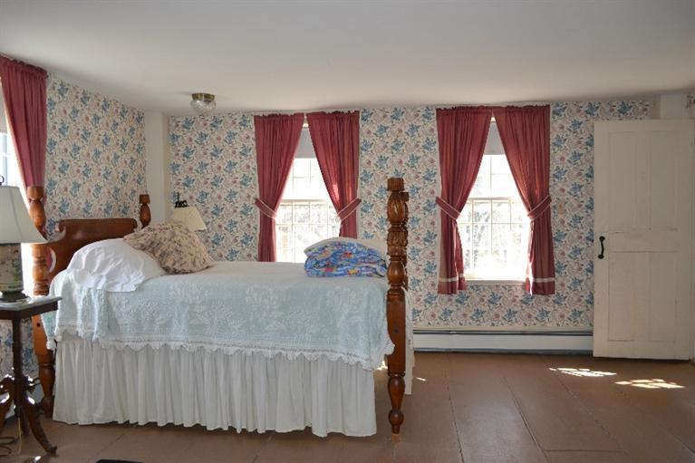 105 Spring Hill Road East Sandwich, MA 02537 - Photo 16 of 33 a bedroom with a bed and window