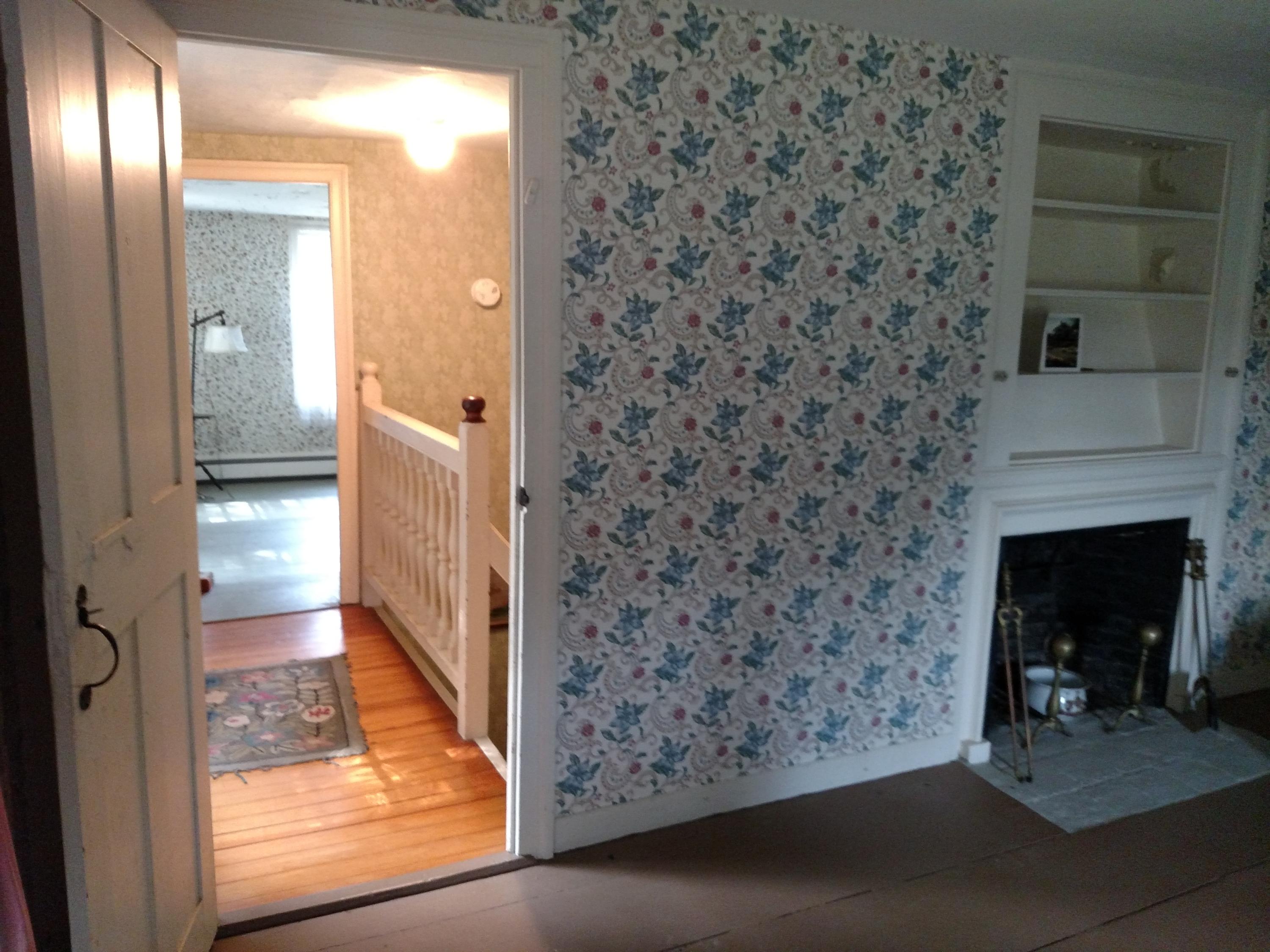 105 Spring Hill Road East Sandwich, MA 02537 - Photo 18 of 33 a view of a livingroom with wooden floor and a fireplace