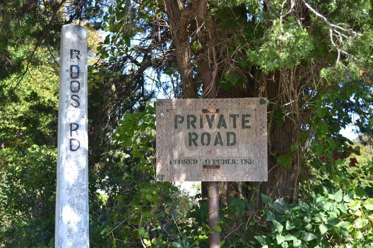 105 Spring Hill Road East Sandwich, MA 02537 - Photo 27 of 33 a sign that is sitting in front of a tree