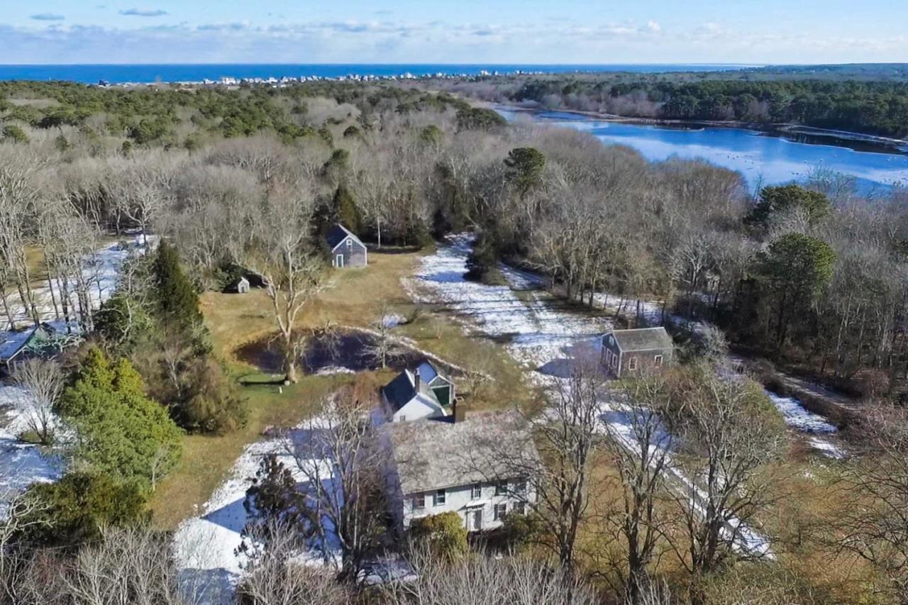 105 Spring Hill Road East Sandwich, MA 02537 - Photo 30 of 33 a view of a town with trees in the background