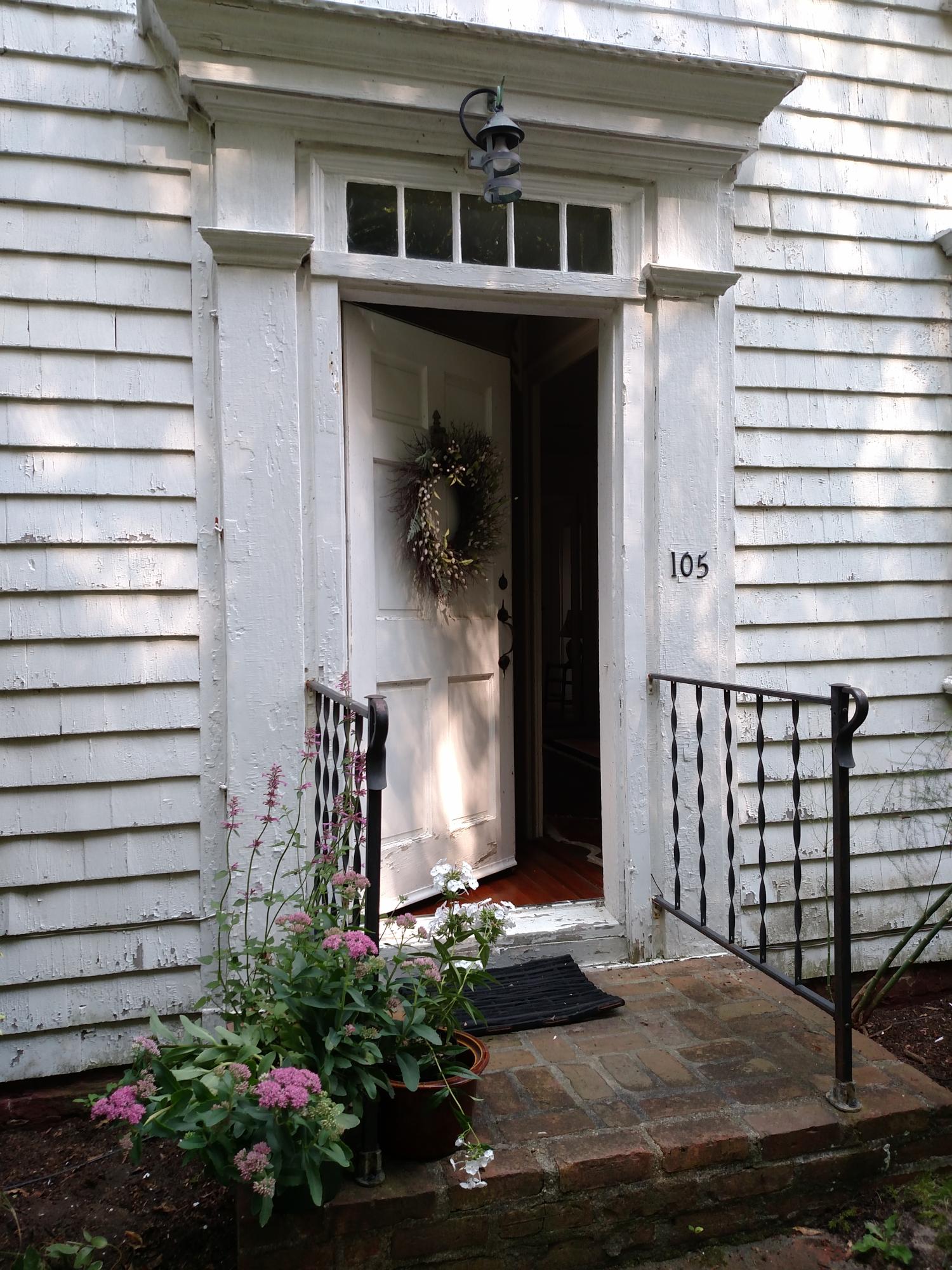 105 Spring Hill Road East Sandwich, MA 02537 - Photo 5 of 33 a front view of a house with plants