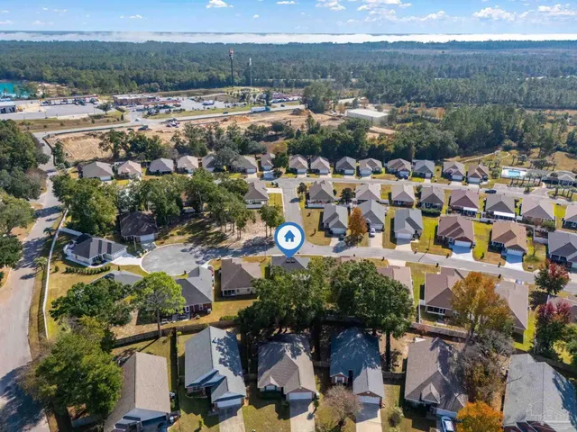 an aerial view of residential building with outdoor space