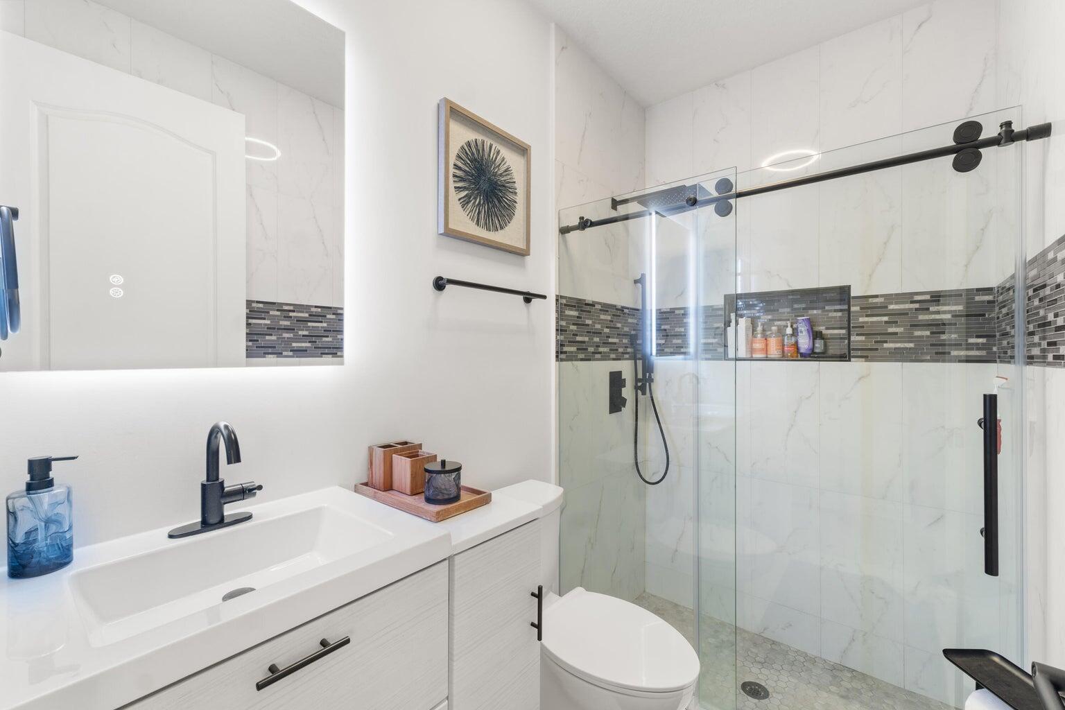 3643 Northwest 5th Terrace Boca Raton, FL 33431 - Photo 25 of 31 lisa-down stairs bathroom