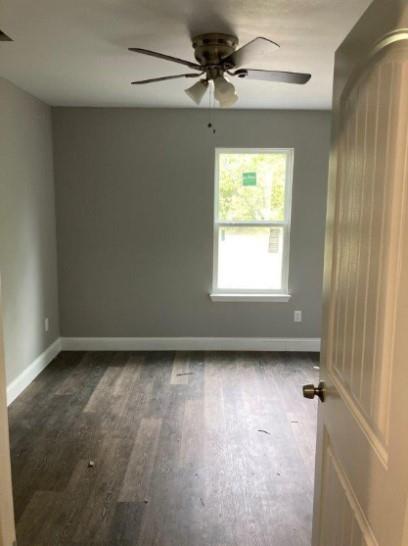 809 South Travis Avenue Denison, TX 75021 - Photo 10 of 13 a view of an empty room with a window