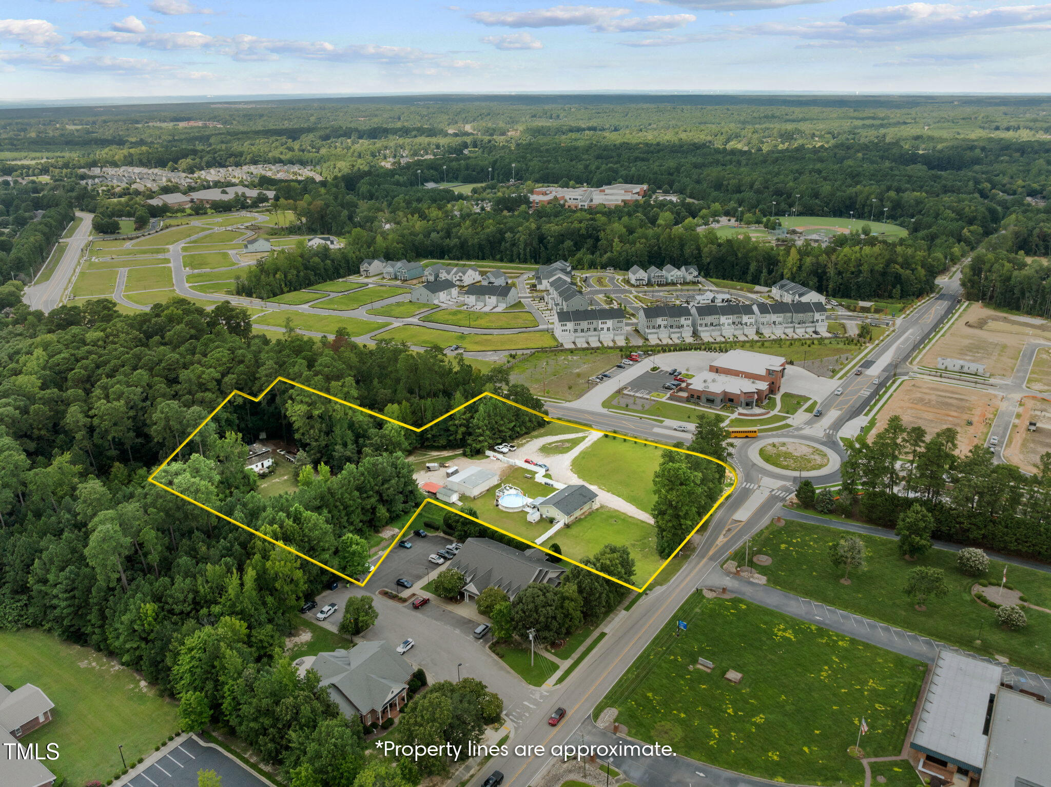 7416 Forestville Road Knightdale, NC 27545 - Photo 13 of 14 an aerial view of residential houses with outdoor space