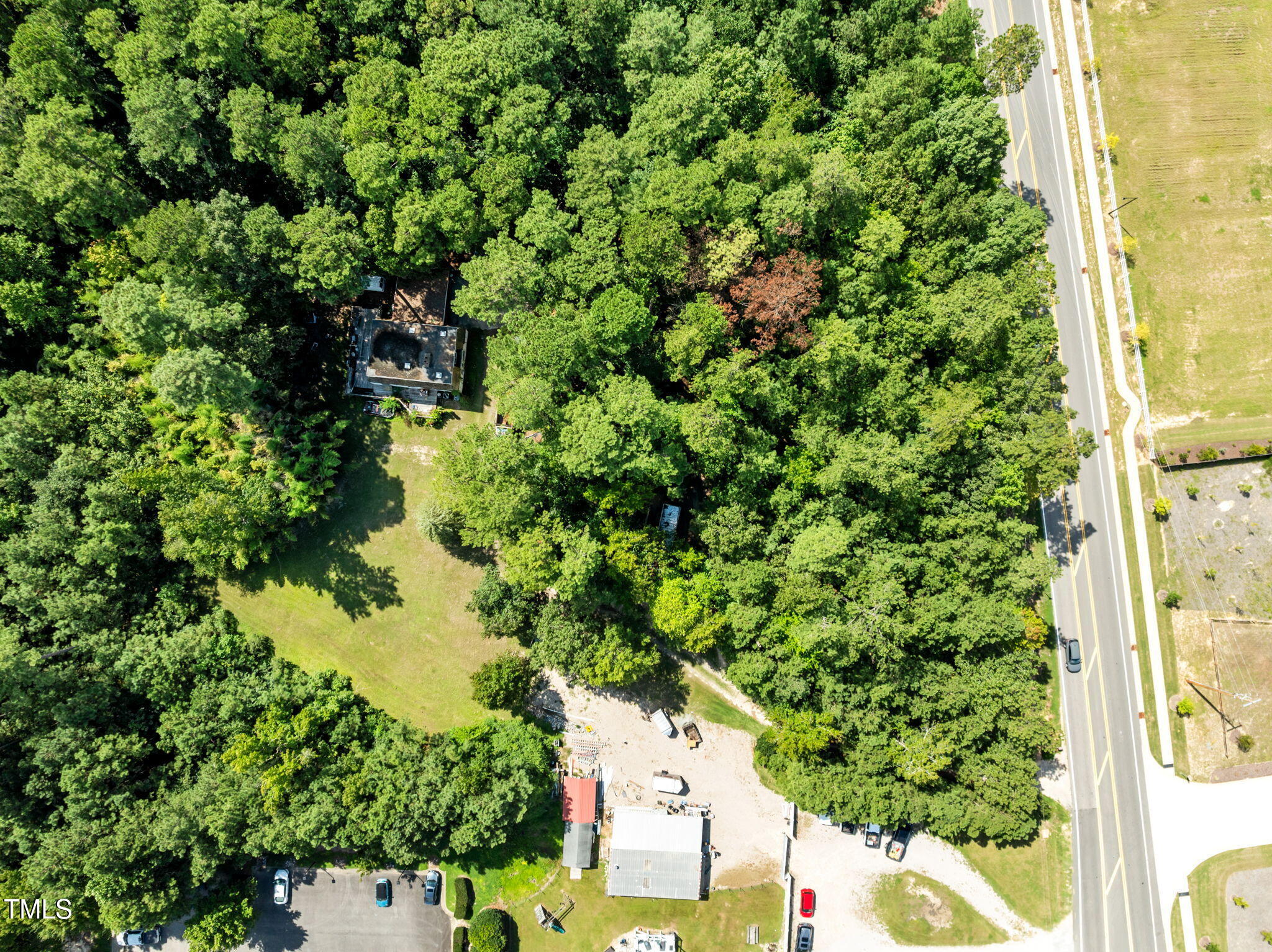 7416 Forestville Road Knightdale, NC 27545 - Photo 2 of 14 a view of a tree with a yard