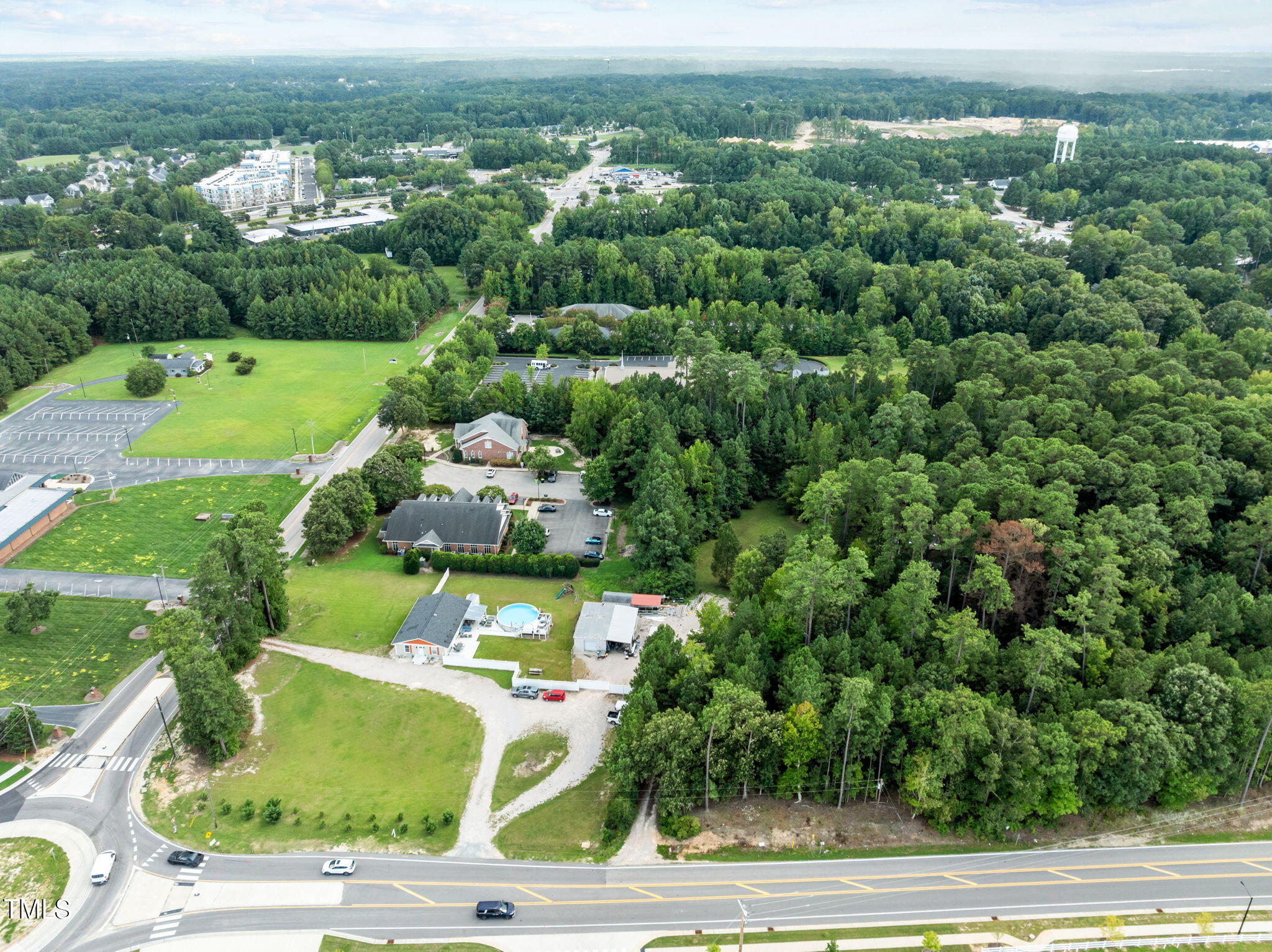 7416 Forestville Road Knightdale, NC 27545 - Photo 3 of 14 an aerial view of residential houses with outdoor space and trees