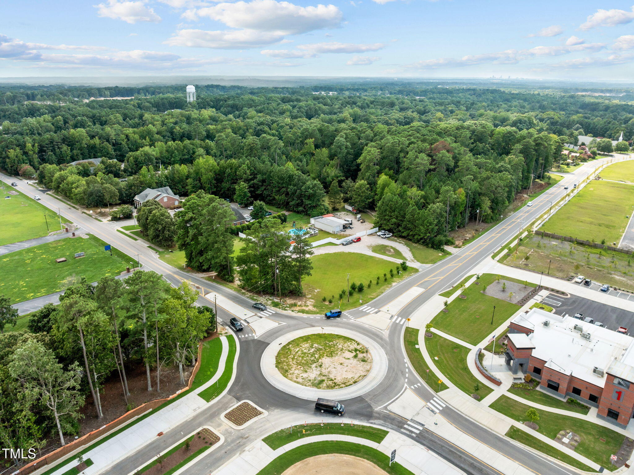 7416 Forestville Road Knightdale, NC 27545 - Photo 5 of 14 an aerial view of a house with garden space and patio