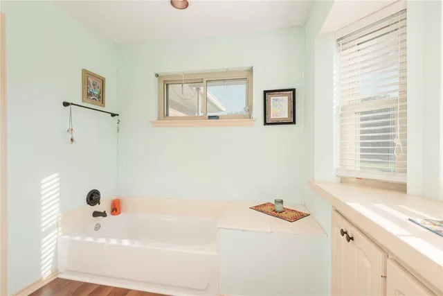 a bathroom with a sink and a bathtub