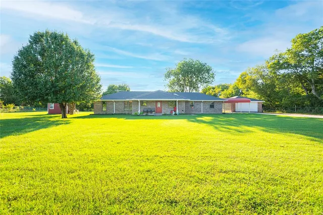 a view of a swimming pool with an outdoor space