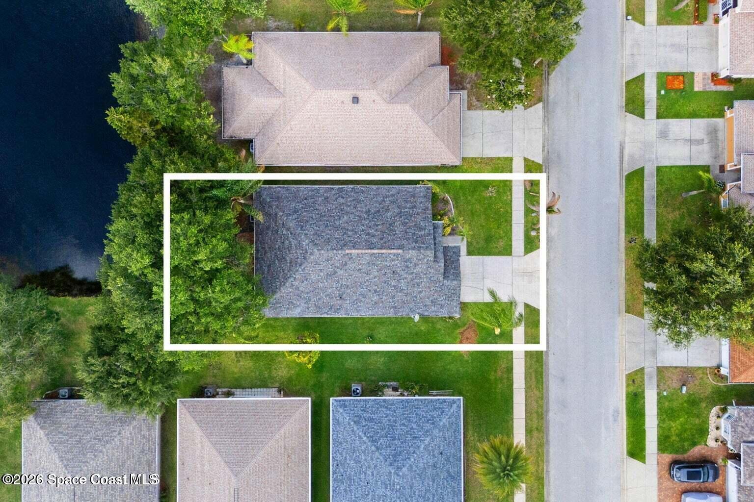 4741 Decatur Circle Melbourne, FL 32934 - Photo 37 of 44 an aerial view of house with a yard