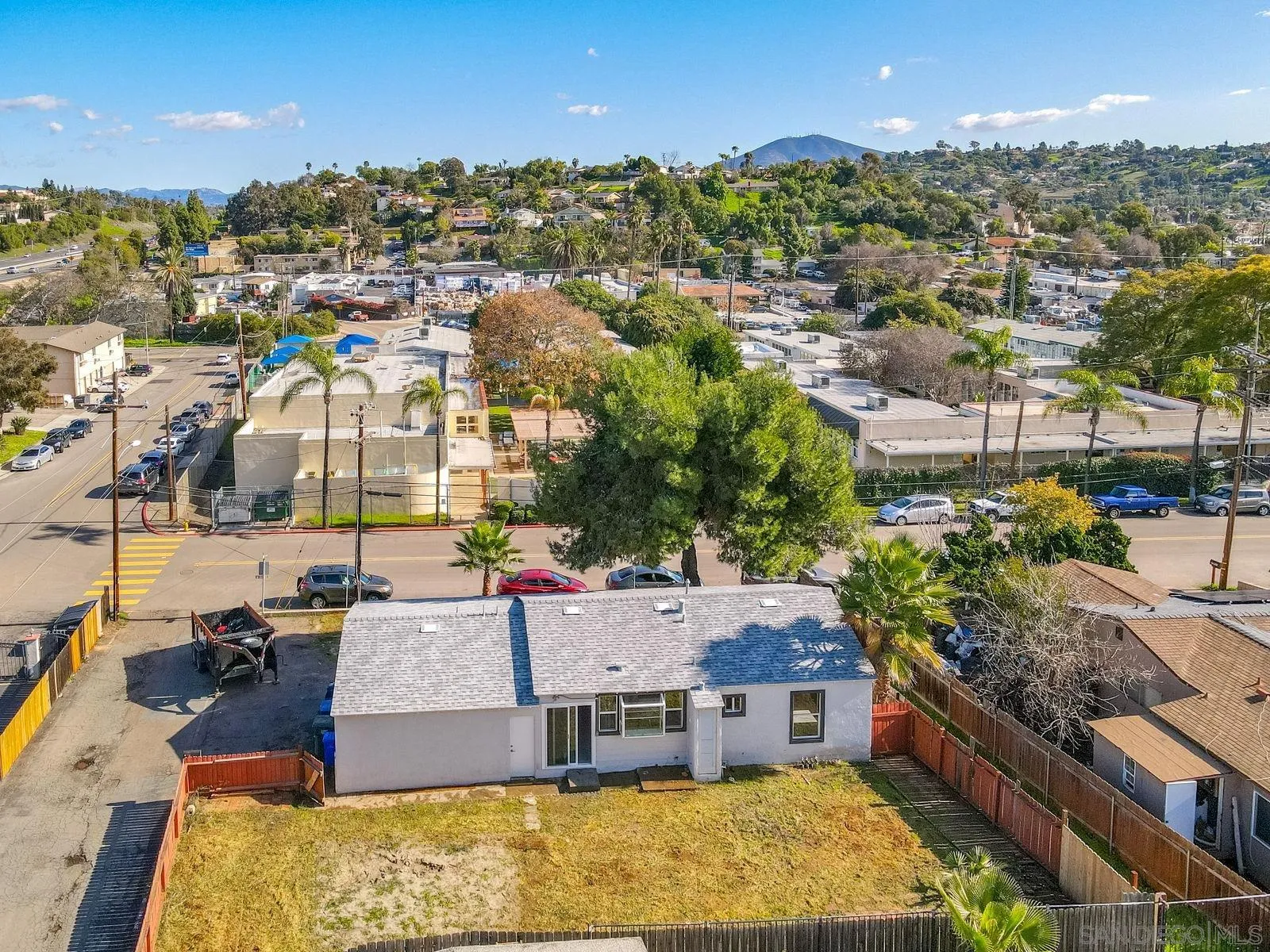 3862 Spring Drive Spring Valley, CA 91977 - Photo 3 of 18 an aerial view of residential houses with outdoor space and swimming pool