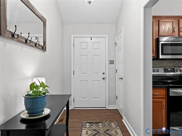 a view of dining room and wooden floor