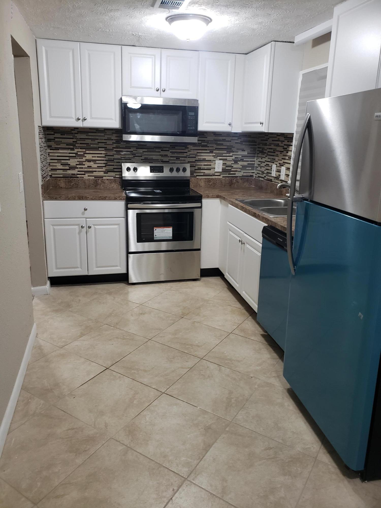 2116 Leonid Road Jacksonville, FL 32218 - Photo 5 of 25 20190610_151626