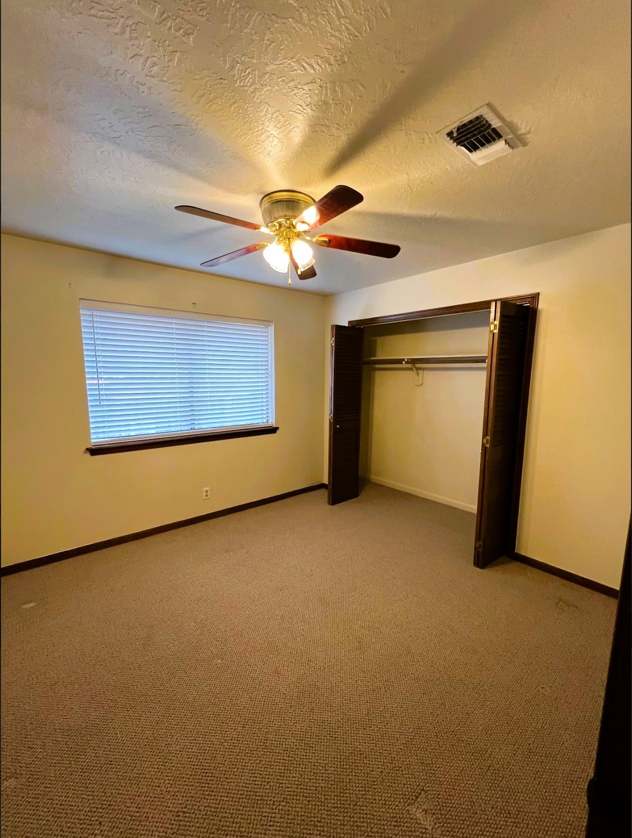 102 Briar Ridge Drive Bellville, TX 77418 - Photo 12 of 15 a view of an empty room with a window