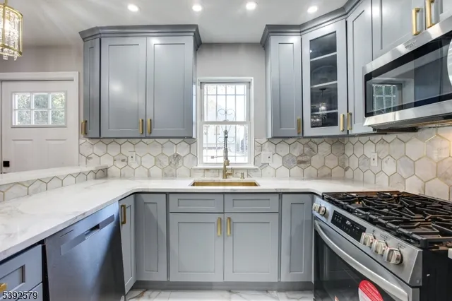 a view of a dining room with furniture and window
