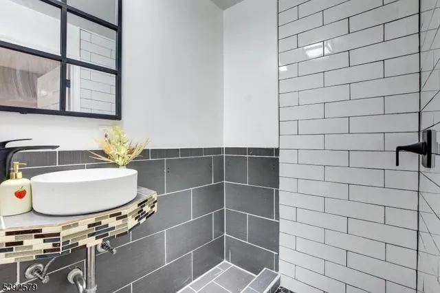 a bathroom with a toilet and a sink