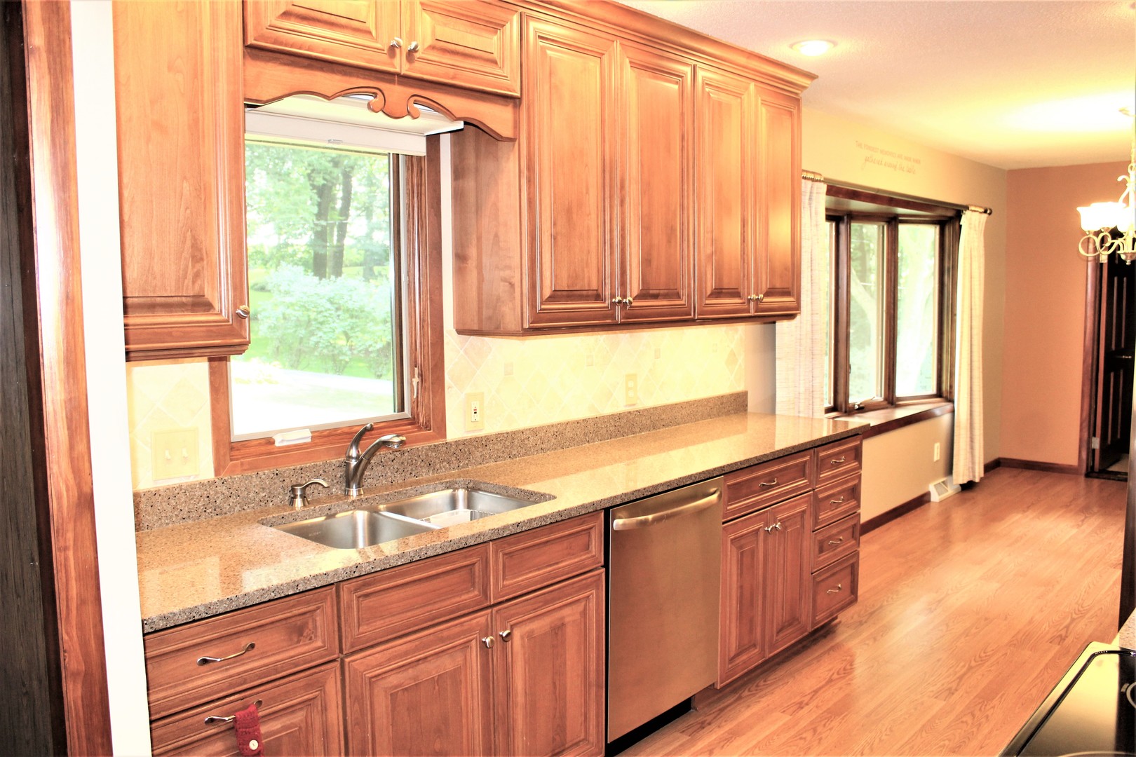 15890 Bishop Road Morrison, IL 61270 - Photo 12 of 34 a kitchen with granite countertop a sink and a window