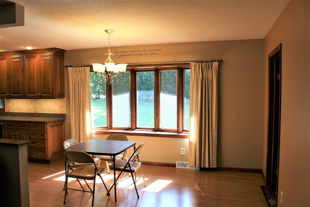 15890 Bishop Road Morrison, IL 61270 - Photo 13 of 34 a dining room with furniture and windows
