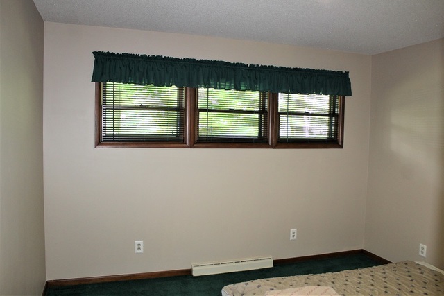 15890 Bishop Road Morrison, IL 61270 - Photo 20 of 34 an empty room with a window