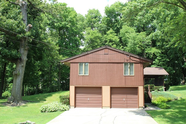 15890 Bishop Road Morrison, IL 61270 - Photo 3 of 34 a front view of a house with a yard