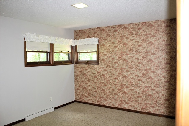 15890 Bishop Road Morrison, IL 61270 - Photo 23 of 34 an empty room with windows